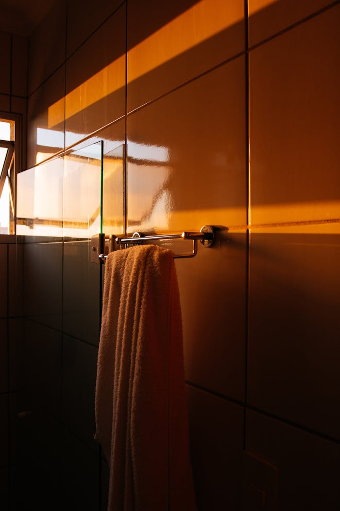 services-img A serene bathroom illuminated by warm sunset light, creating a calming ambience.